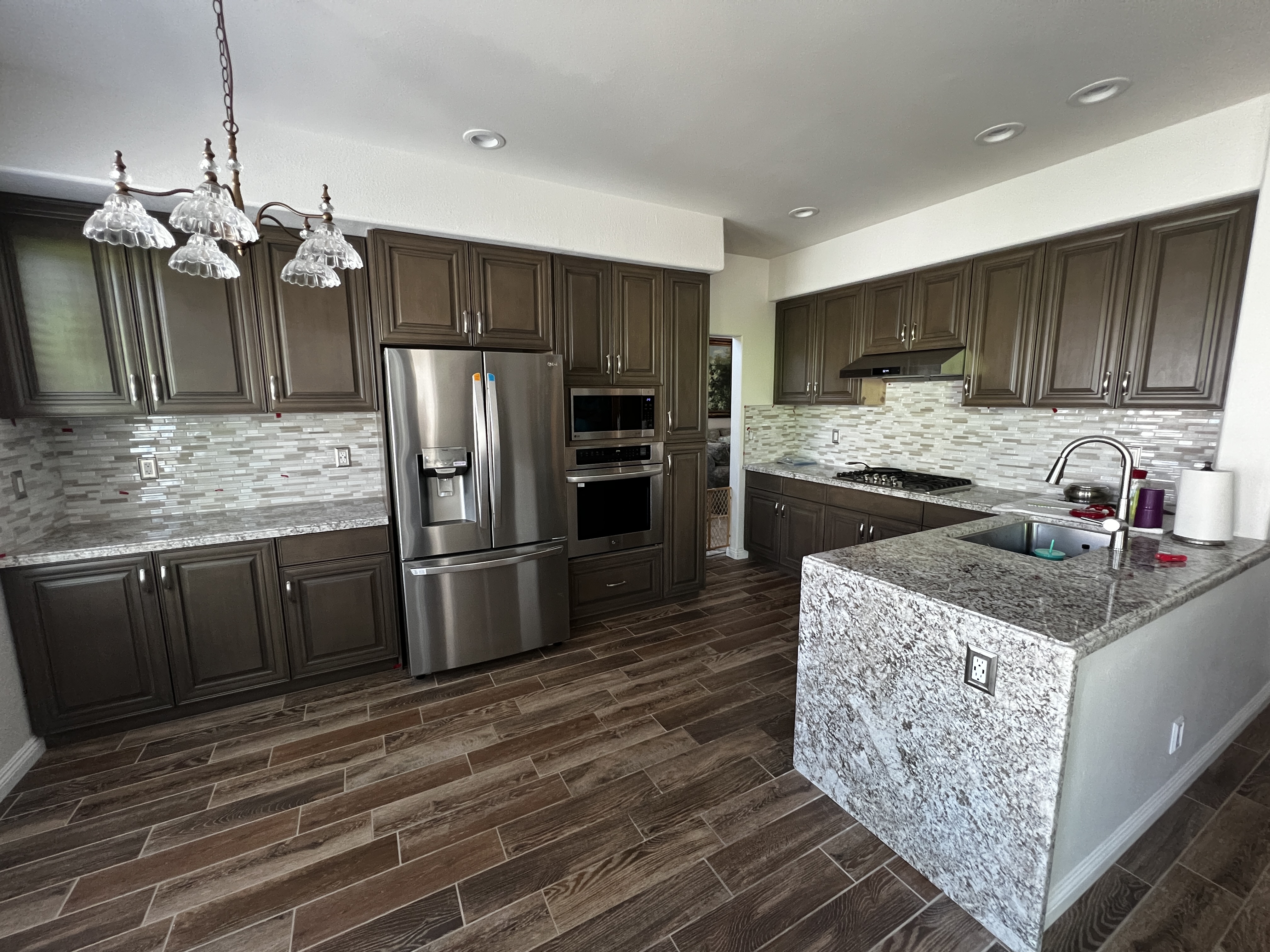 Kitchen island topped with granite stone