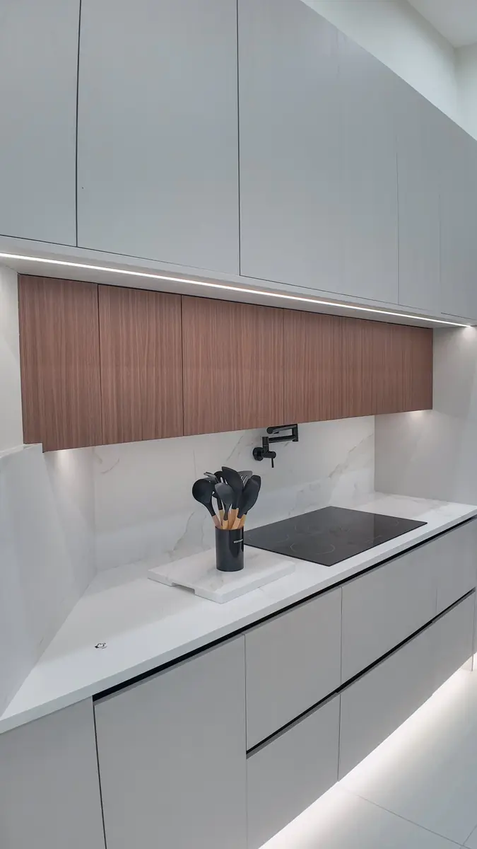 Cooktop installation with a tiled backsplash wall