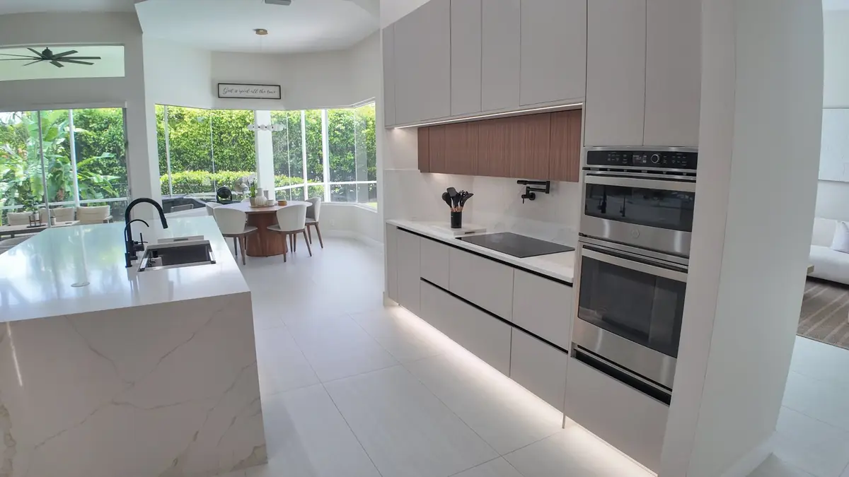 Open kitchen layout planned around a central island with seating